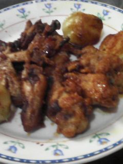 Una foto de Alitas de pollo con salsa barbacoa
