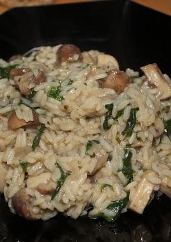 Una foto de Risotto de champiñones y espinacas