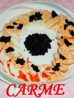 Una foto de Langosta con caviar y salsa rosa