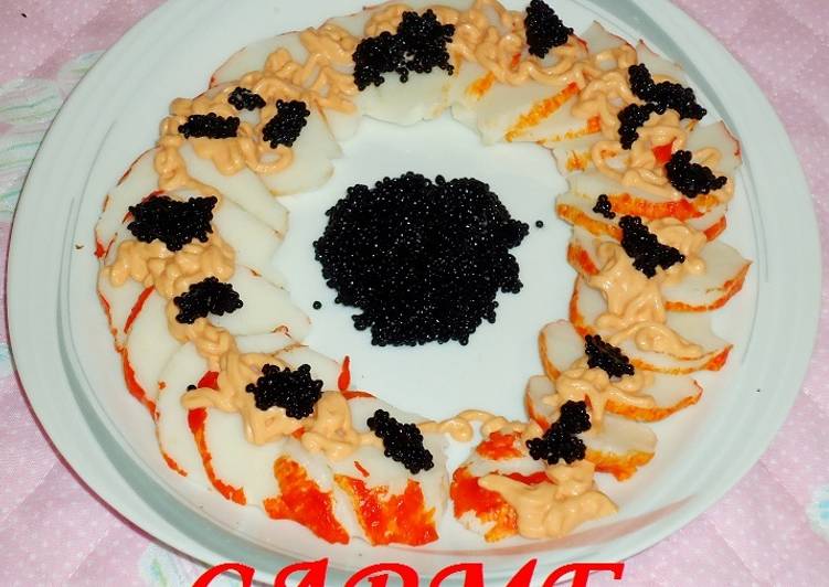 Langosta con caviar y salsa rosa