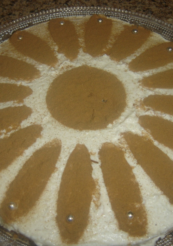 Una foto de Tarta mouse de arroz con leche