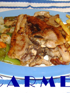 Una foto de Costillas de cordero con verduras salteadas
