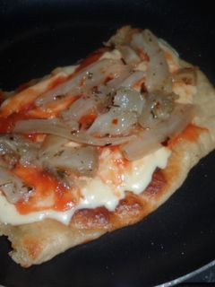 Una foto de Pizza frita con berenjenas