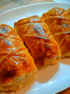 Una foto de Solomillos Wellington con bacon y cebolla caramelizada
