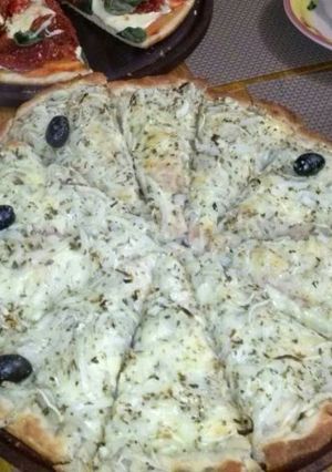 Una foto de Pizza fugazzeta rellena