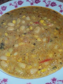 Una foto de Porotos granados con pirco y mazamorra