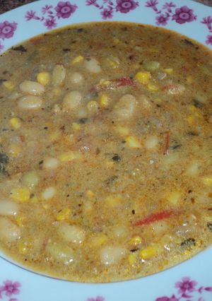 Una foto de Porotos granados con pirco y mazamorra