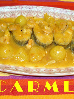 Una foto de Lubina y gambas en salsa