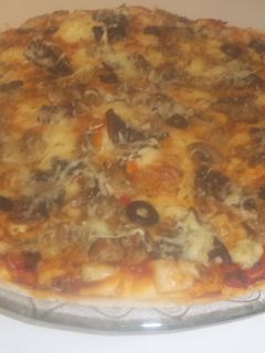 Una foto de Pizza de setas y champiñones