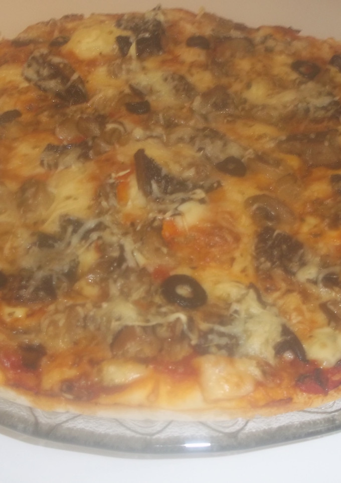 Una foto de Pizza de setas y champiñones