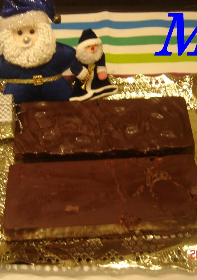 Una foto de Turrón de chocolate con ganache de nueces de Macadamia caramelizadas
