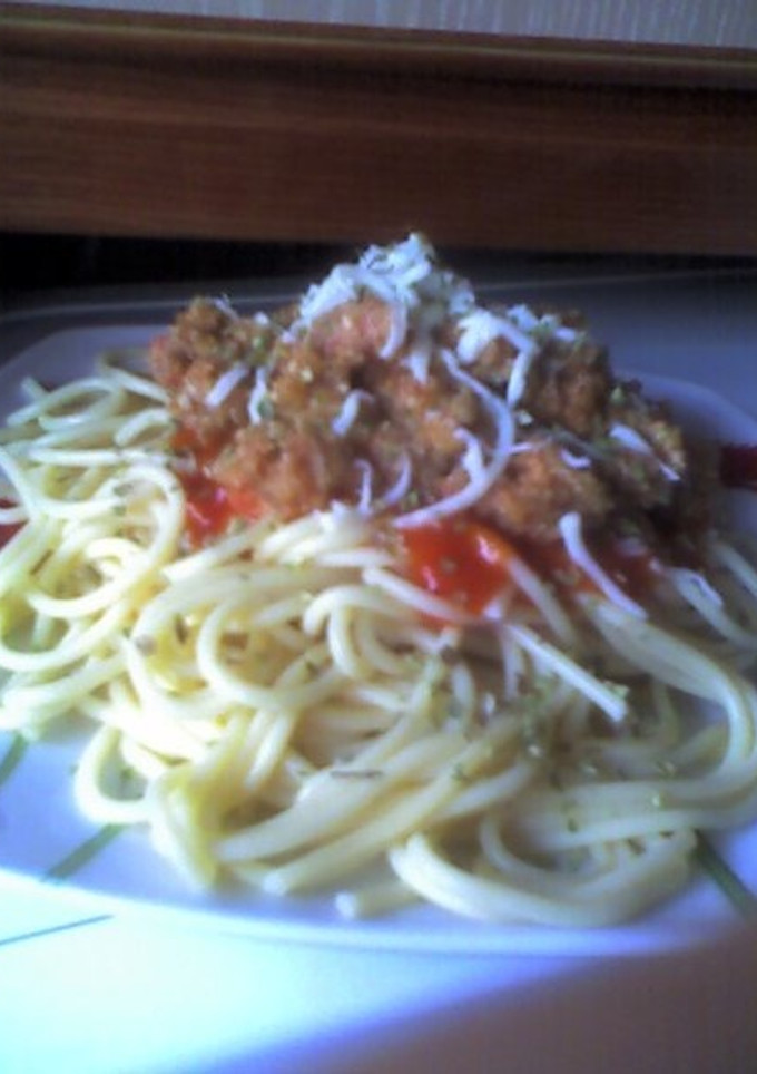 Una foto de Spaguettis boloñesa vegetarianos