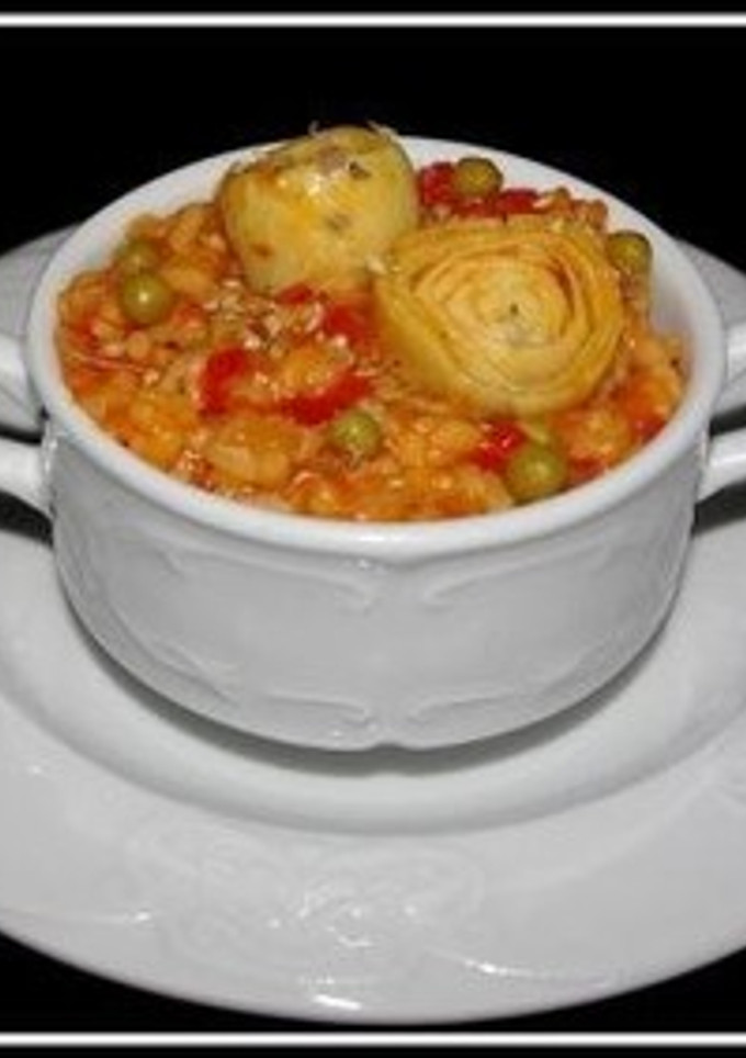 Una foto de Arroz a lo pobre con alcachofas