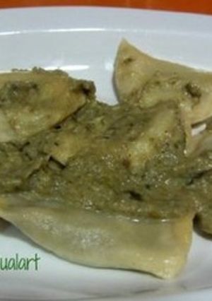 Una foto de Pasta fresca rellena de alcachofas