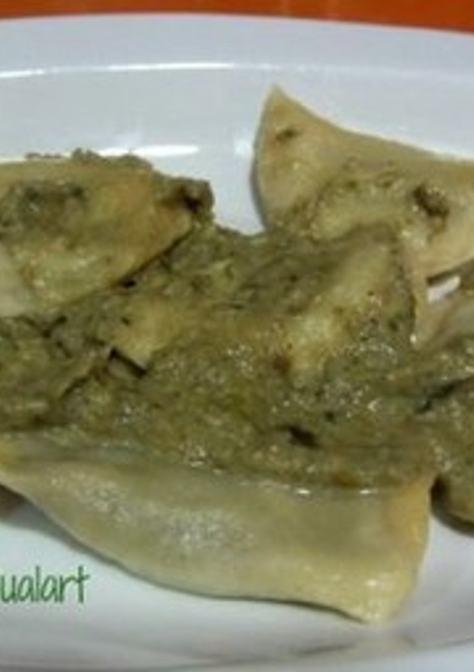 Una foto de Pasta fresca rellena de alcachofas