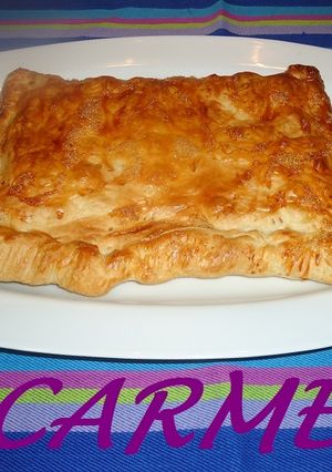 Una foto de Hojaldre de langostinos y espinacas