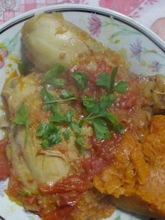 Una foto de Estofado de pollo con zapallo y tomates 