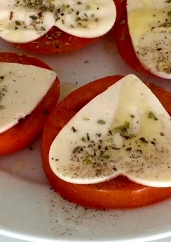 Una foto de Tomates con mozzarella