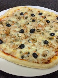 Una foto de PIZZA CASERA AMC