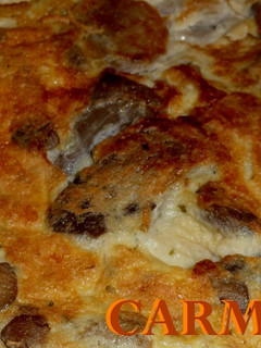 Una foto de Tortilla de setas cultivadas a las finas hierbas