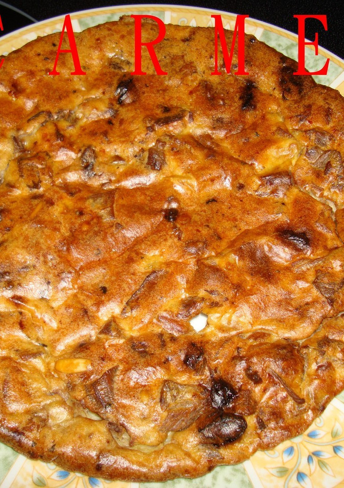 Una foto de Pastel de carne y frutos secos
