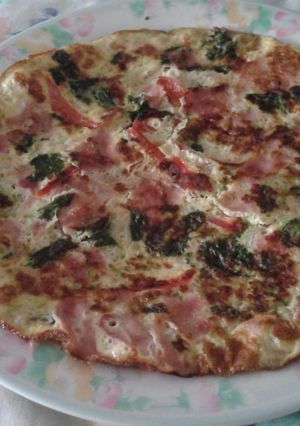 Una foto de Tortilla colorida de vegetales
