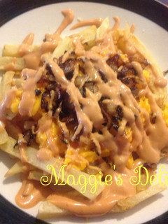 Una foto de Papas fritas con queso