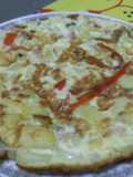 Tortilla de papas y vegetales con tocineta