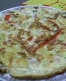 Tortilla de papas y vegetales con tocineta