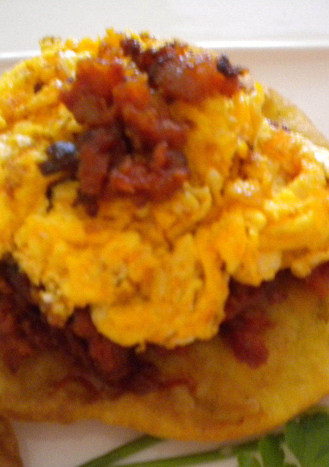 Una foto de Tortos con picadillo y huevo