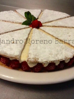 Una foto de Tarta de queso y crema