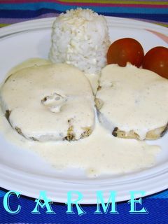 Una foto de Merluza al horno con salsa de cava