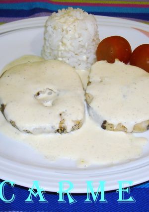 Una foto de Merluza al horno con salsa de cava