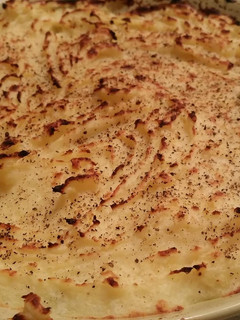 Una foto de Puré de papas gratinado