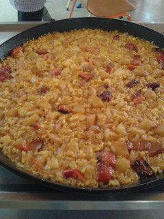 Una foto de Arroz con cebolla y bacalao