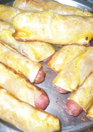 Una foto de Empanadas de salchichas y queso con curry