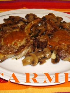 Una foto de Costillas de cerdo al horno con champiñones