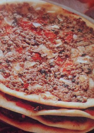 Una foto de Empanadas árabes, versión pizzas