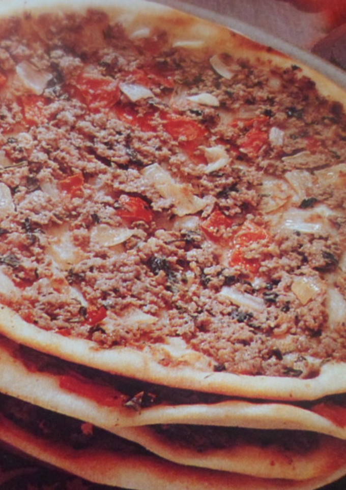 Una foto de Empanadas árabes, versión pizzas