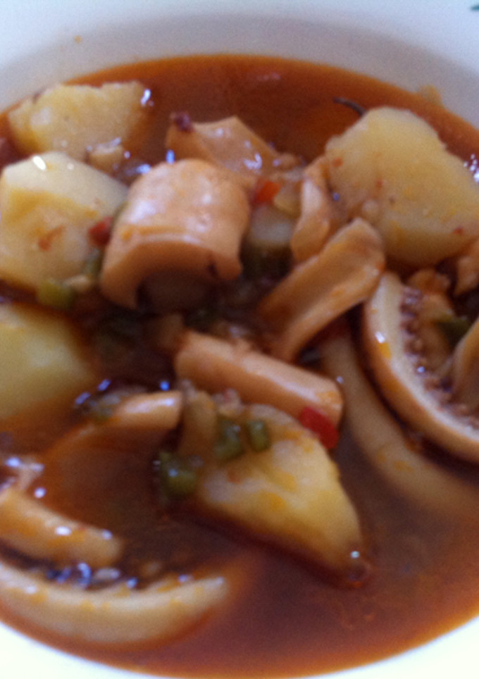 Una foto de Papas con potas (o calamares)
