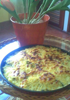Una foto de Pastel de arroz gratinado con palmito y papa