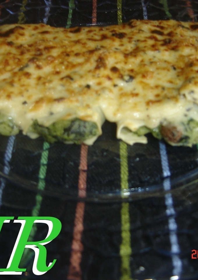 Una foto de Canelones de bacalao con espinacas