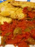 Lomo de cerdo empanado con sofrito de pimientos