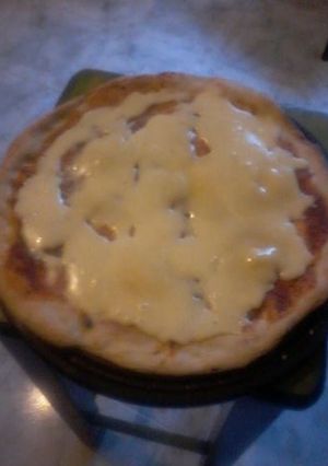 Una foto de Pizza tradicional italiana
