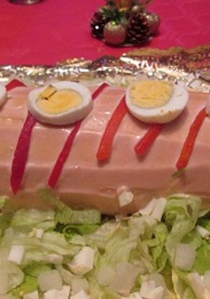 Una foto de Pionono relleno con crema de pavo y piña 