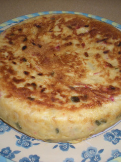 Una foto de Tortilla de patatas con chorizos