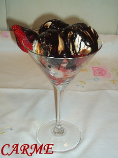 A picture of Ice Cream with Chocolate-Covered Strawberries.