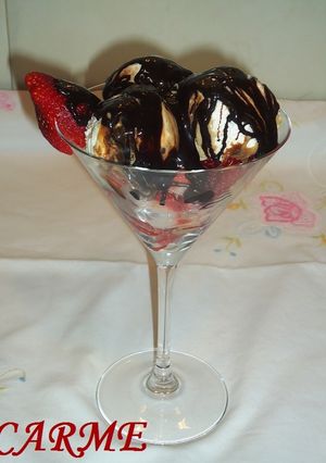 A picture of Ice Cream with Chocolate-Covered Strawberries.