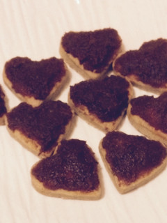 Una foto de Polvorones de puré de tomates confitados