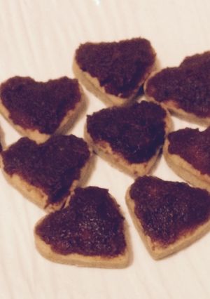 Una foto de Polvorones de puré de tomates confitados